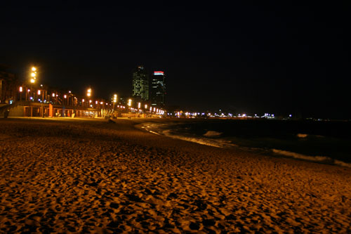 The beach of Barcelona at night