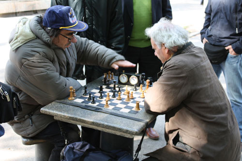 Old people playing chess
