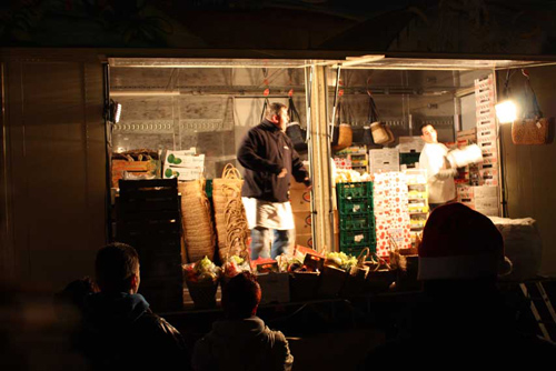 In this case, he is trying to sell fruits