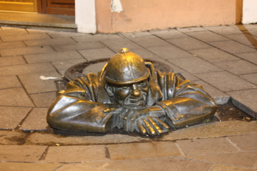 Cumil is watching you from a manhole cover